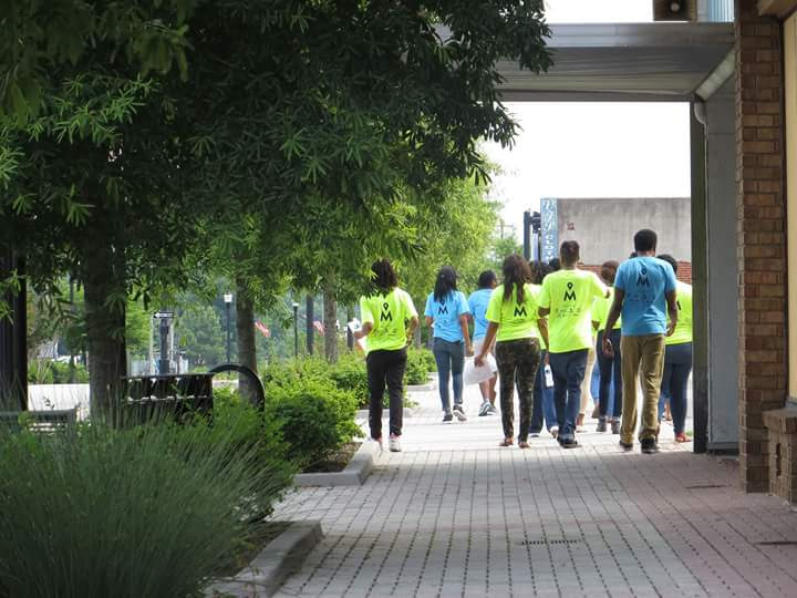 MAPSCorps high school and college age researches walking through Rocky Mount.