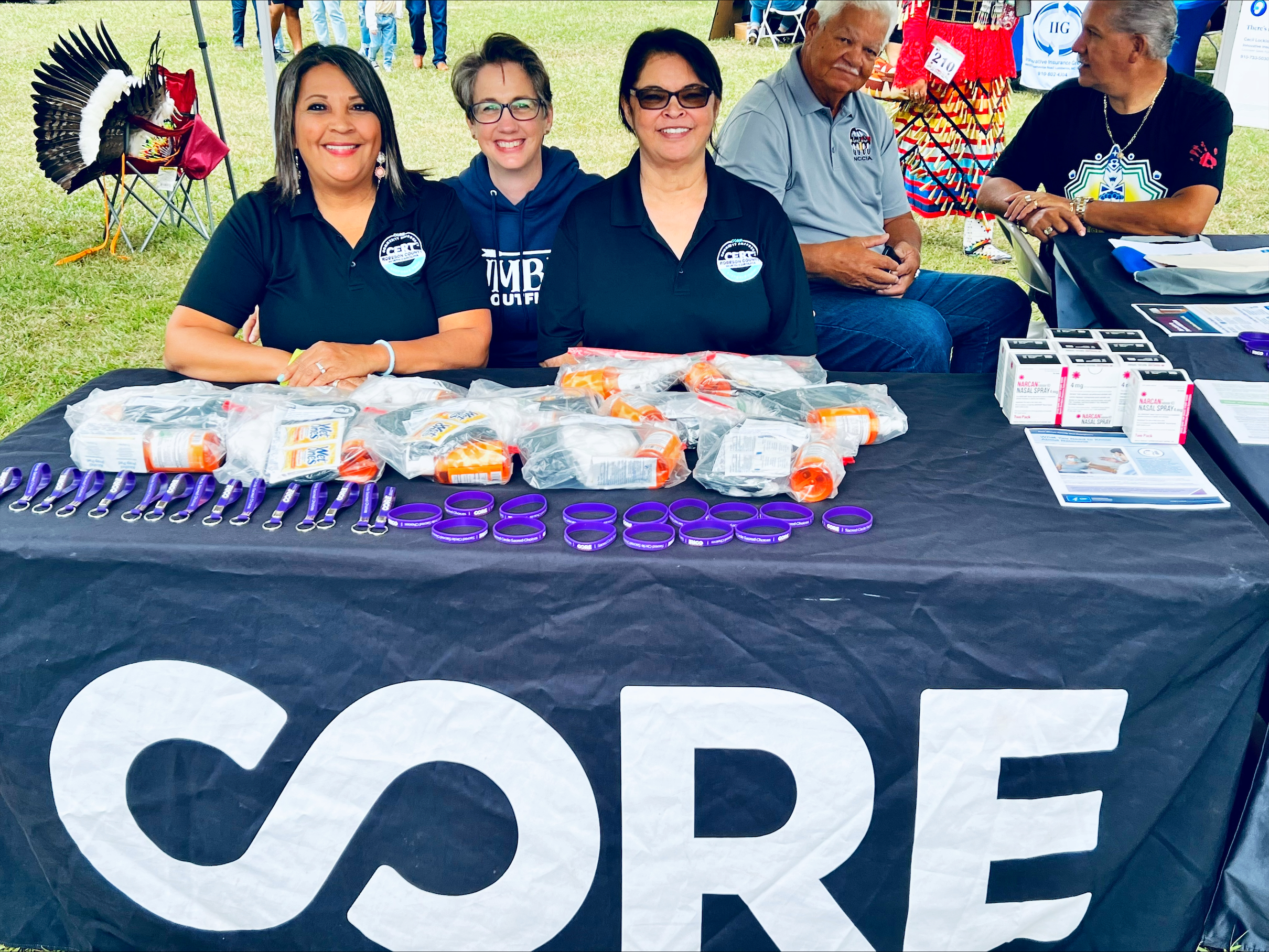 Linda Oxendine, Robyn Jordan and other team members at a community event.